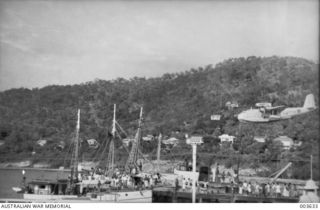 PORT MORESBY - A18-10 ABOUT TO ALIGHT IN HARBOUR BEARING SIR HUBERT MURRAY'S REMAINS BROUGHT BACK FROM SAMARAI. RAAF SURVEY FLIGHT. (NEGATIVE BY N. TRACY)