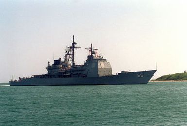 A starboard bow view of the guided missile cruiser USS CHOSIN (CG-65) as it enters the channel for a visit to the naval station.