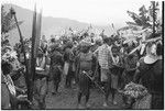 Pig festival, pig sacrifice, Tsembaga: people crowd the dance ground