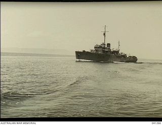 Milne Bay, Papua. c. 1943. Australian corvette HMAS Gympie