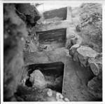 Looking east from above into three excavated squares of Te Ana Pu, Aukena, better negative than no 163