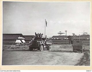 RABAUL, NEW BRITAIN. 1945-11-16. THE ENTRANCE TO THE CAR PARK AT HEADQUARTERS 5 BASE SUB AREA