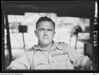 MALMAL VILLAGE, JACQUINOT BAY. NEW BRITAIN. 1944-12-09. MAJOR-GENERAL A.H. RAMSAY, GENERAL OFFICER COMMANDING HEADQUARTERS 5 DIVISION