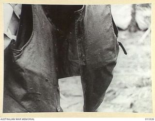 1942-10-01. NEW GUINEA. MILNE BAY. A BULLET PROOF VEST FOUND AFTER AUSTRALIAN FORCES HAD REPULSED AN ATTEMPTED JAPANESE LANDING