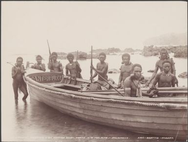 Cannibals standing around the mission boat at Foate, Malaita, Solomon Islands, 1906 / J.W. Beattie