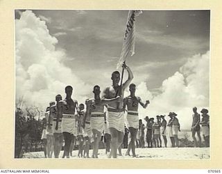 KELANOA, NEW GUINEA 1944-02-20. THE 30TH INFANTRY BATTALION TEAM IN THE MARCH PAST AT THE MOST FORWARD BEACH CARNIVAL HELD IN NEW GUINEA. THE CARNIVAL WAS ORGANISED BY CAPTAIN A.E. RICHARDS AND ..