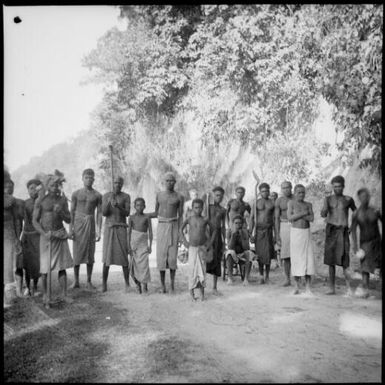 Group of men and boys involved in clearing volcanic eruption debris, Rabaul, New Guinea, 1937 / Sarah Chinnery