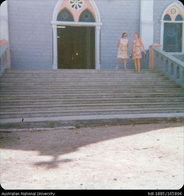 Two women on church stairs