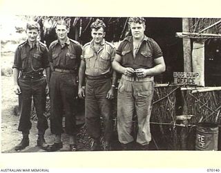 RAMU VALLEY, NEW GUINEA. 1944-02-04. STAFF OF AN ORDNANCE STORES DUMP OPERATED BY 7TH DIVISION ORDNANCE SERVICES. IDENTIFIED PERSONNEL ARE:- WX6514 PRIVATE E.B. WAKEFIELD (1); NX95800 PRIVATE A.J. ..