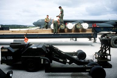 U.S. Air Force personnel prepare Mark 52 air-delivered underwater mines for loading aboard a B-52 Stratofortress aircraft during exercise Team Spirit '86