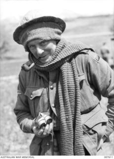 NX10106 BOMBARDIER K.W. NETTLESHIP, LATE OF NEW GUINEA AND NOW OF THE 1ST ANTI-TANK REGIMENT HAD A NARROW ESCAPE FROM SERIOUS WOUNDING WHEN BULLET STRUCK HIM AND LODGED IN HIS TOBACCO TIN. ..