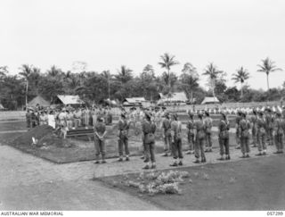 SOPUTA, NEW GUINEA. 1943-09-29. GENERAL VIEW OF THE BURIAL SERVICE FOR BRIGADIER R. B. SUTHERLAND CONDUCTED BY QX6293 PADRE S. COWEN, DEPUTY ASSISTANT CHAPLAIN-GENERAL OF THE CHURCH OF ENGLAND