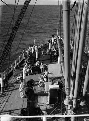 [People on the foredeck of a cruise ship]