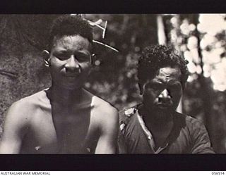 REINHOLD HIGHWAY, NEW GUINEA, 1943-09-02. TWO NEW GUINEA HOUSEBOYS ATTACHED TO MILITARY HISTORY SECTION