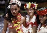 French Polynesia, women wearing leis and flower crowns on Moorea Island