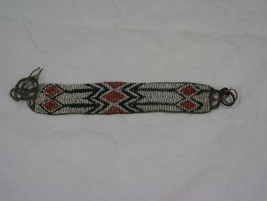 Woven shell arm band