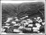 Cluster of grass huts of a Japanese village in Hawaii