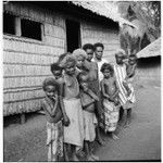 Group portrait in front of house