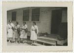 [Army nurses in front of nurses' quarters, 1942]