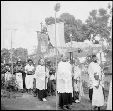 Priests in the Corpus Christi Procession, Vunapope Sacred Heart Mission, Kokopo, New Guinea, 1937 / Sarah Chinnery