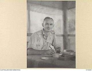 NARAKAPOR, NEAR NADZAB, NEW GUINEA. 1944-05-27. NX170425 CAPTAIN F AUTRY-HALL, OFFICER COMMANDING 6TH FARM COMPANY, AUSTRALIAN ARMY SERVICE CORPS. CAPTAIN AUTRY-HALL, A GRADUATE FROM THE HAWKESBURY ..