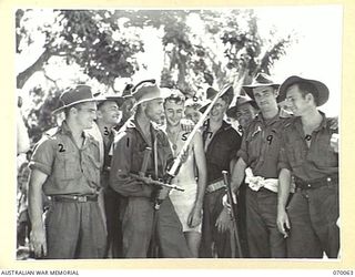 SIO, NEW GUINEA. 1944-01-24. 6960611 C.M. STEWART (1); OF THE UNITED STATES ARMY, VOLUNTEERED FOR SERVICE IN 1939. SEEKING COMBAT HE TRANSFERRED FROM AN AMERICAN PROVISIONAL TRUCK COMPANY AT ..