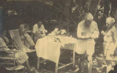 Picnic lunch at Saiho, Dr. H. Gilbie-Brown & Med Asst [i.e.Medical Assistant] W. Race, [1951] Albert Speer