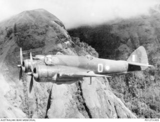 A Bristol Beaufighter aircraft (MK 1 C, A19-15, `O') of No. 30 Squadron RAAF in flight returning to Port Moresby after a raid on Lae. The pilot was Flying Officer Brazenor and the navigator was ..