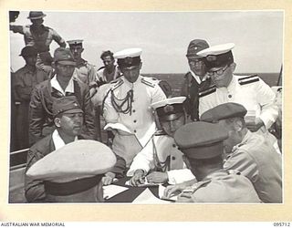 AT SEA OFF RABAUL, NEW BRITAIN. 1945-09-04. PRE- SURRENDER DISCUSSIONS ABOARD HMAS VENDETTA AT A SEA RENDEZVOUS OFF RABAUL BETWEEN REPRESENTATIVES OF LIEUTENANT GENERAL V.A.H. STURDEE, GENERAL ..