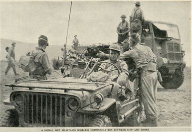 A signal jeep maintains wireless communication between ship and shore