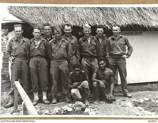 DUMPU, NEW GUINEA. 1944-01-16. THE STRIP CONTROL STAFF, 7TH DIVISION STRIP COMMAND, OUTSIDE THE CONTROL ROOM OF NO. 2 STRIP. IDENTIFIED PERSONNEL ARE: TX1619 SERGEANT G. A. SMITH (1); VX72168 ..