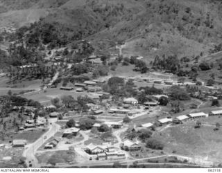 PORT MORESBY AREA, NEW GUINEA. 1943-12-29. ROYAL AUSTRALIAN AIR FORCE HEADQUARTERS AND ADMINISTRATIVE BUILDING, TAKEN FROM THE HEAVY ANTI-AIRCRAFT GUN SITE BEHIND TUA-GUBA HILL