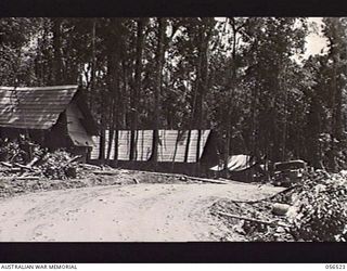 REINHOLD HIGHWAY, NEW GUINEA, 1943-09-04. AUSTRALIAN ARMY SERVICE CORPS DUMP, ONE MILE FROM BULLDOG. THIS IS THE MAIN ISSUING POINT FOR THE TROOPS AS FAR NORTH AS CAMP ELOA