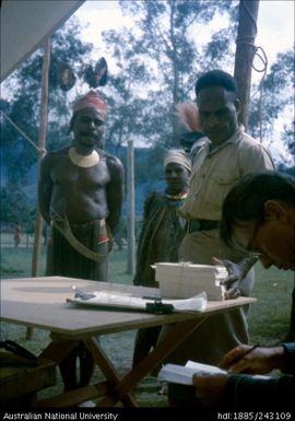 Man collecting ballot paper