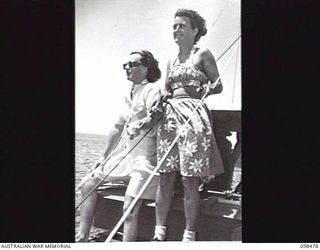 EN ROUTE TO KOIL ISLAND, NEW GUINEA, 1945-10-31. A VISIT TO KOIL ISLAND WAS ARRANGED BY THE RED CROSS FOR THE PURPOSE OF MEDICAL INSPECTION OF THE NATIVE INHABITANTS. THE VISITING PARTY CONSISTED ..