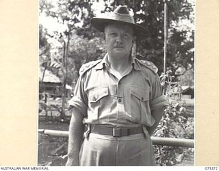 LAE, NEW GUINEA. 1944-08-19. VX12721 COLONEL A.J. STEWART, DEPUTY DIRECTOR OF SUPPLIES AND TRANSPORT, HEADQUARTERS, NEW GUINEA FORCE