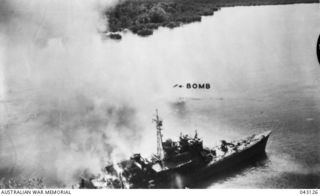 New Hanover, Bismarch Archipeligo. 1944-02-16. An attack by B25 bombers on a Japanese convoy. Picture shows a patrol craft on fire. It was subsequently left aground