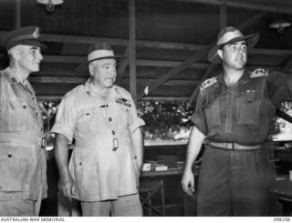 Lieutenant General V A H Sturdee, General Officer Commanding 1st Army (left) and General Sir Thomas A Blamey, Commander in Chief, Allied Land Forces, South West Pacific Area (second from left), ..