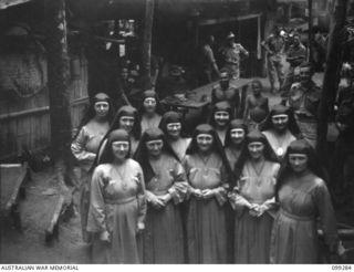 Bitagalip, New Britain. An identification parade of suspected Japanese war criminals was held at Ramale Mission. Shown, the groups of nuns who were present at the parade. Identified is Sister M ..
