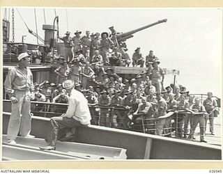 PAPUA, NEW GUINEA. 1942-09-07. MORE A.I.F. FROM THE MIDDLE EAST ARRIVE IN NEW GUINEA. SOME OF THE 2/1ST AUSTRALIAN PIONEER BATTALION ON THE SHIP THAT BROUGHT THEM TO PORT MORESBY