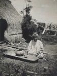 Social Settlements: Hawaii. Wailuku. Alexander House: Alexander House, Wailuku, Hawaii: Native woman pounding poi.