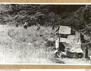 FARIA VALLEY, NEW GUINEA. 1944-01-11. THE TEMPORARY CAMP OF THE MEDIUM MACHINE GUN PERSONNEL OF THE 2/9TH INFANTRY BATTALION ON THE PLATEAU