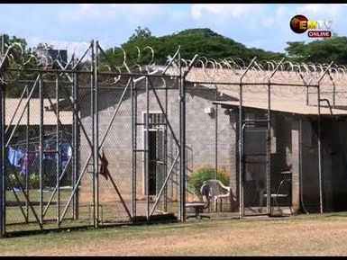 CHURCH VISITS PRISON