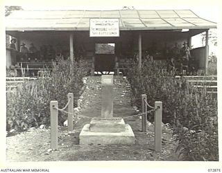 LAE, NEW GUINEA. 1944-05-03. THE MEMORIAL DEDICATED ON 1944-03-10 TO LOST COMRADES OF THE 29TH INFANTRY BRIGADE. THE BRIGADE MOTTO IS PLACED ABOVE THE ENTRANCE TO THE GRANDSTAND AT THE REAR