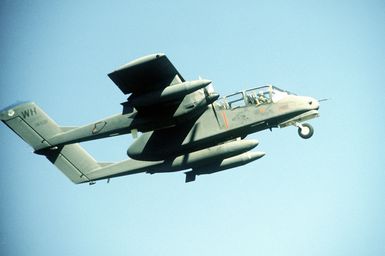 A right underside view of an OV-10 Bronco aircraft from the 22nd Tactical Air Support Squadron (TASS). The aircraft is being deployed to Korea to participate in exercise Team Spirit '84