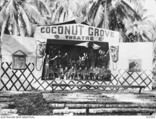 SIAR, NEW GUINEA. 1944-06-28. THE THEATRE AND CONCERT PARTY OF THE 58/59TH INFANTRY BATTALION REHEARSING FOR THEIR CONCERT ON THE STAGE OF THE COCONUT GROVE THEATRE WHICH WAS BUILT BY THE PIONEER ..