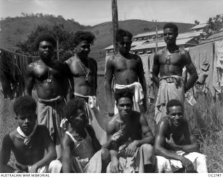 PORT MORESBY, PAPUA. C. 1944. GROUP PORTRAIT OF PAPUAN NATIVES EMPLOYED BY THE RAAF