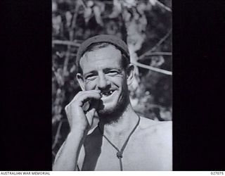 PAPUA, NEW GUINEA, 1942-10. PRIVATE H. MASSON, OF 2/31ST AUSTRALIAN INFANTRY BATTALION SMILES DESPITE THE PRIVATIONS OF THE CAMPAIGN