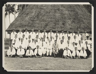 Guy Powles, New Zealand High Commissioner for Samoa, with a group of Samoans