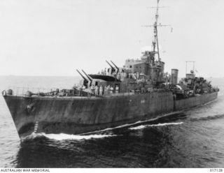 THE AUSTRALIAN TRIBAL CLASS DESTROYER HMAS WARRAMUNGA ON AN OPERATIONAL CRUISE IN THE NEW GUINEA AREA